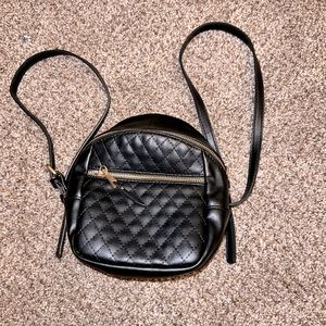 8in black faux leather backpack